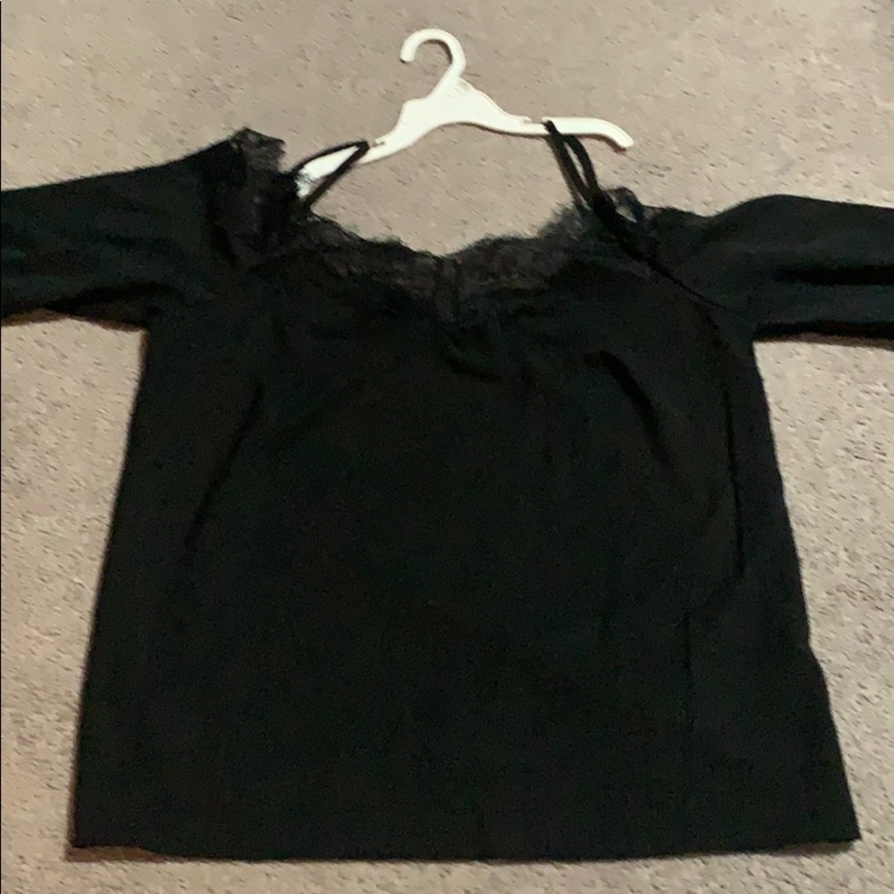 Black loose fitting top with lace trim